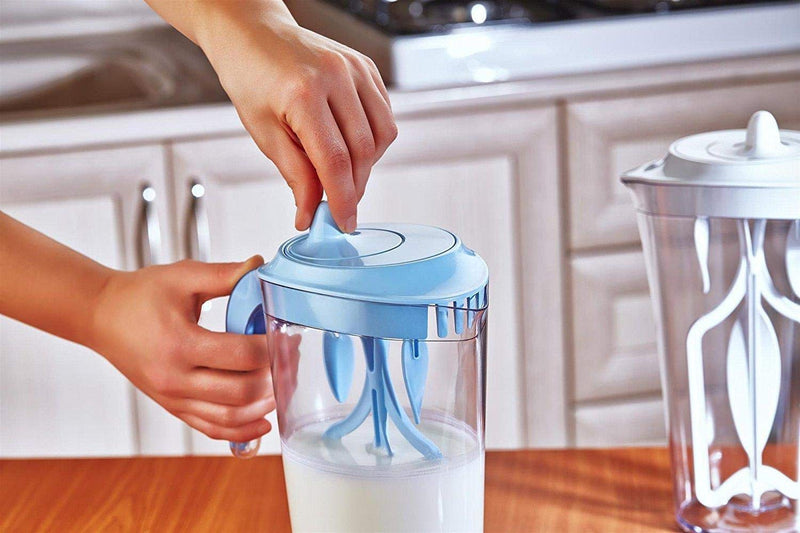 Side angle of eco-friendly mixer jug showing ergonomic grip and transparent body.

